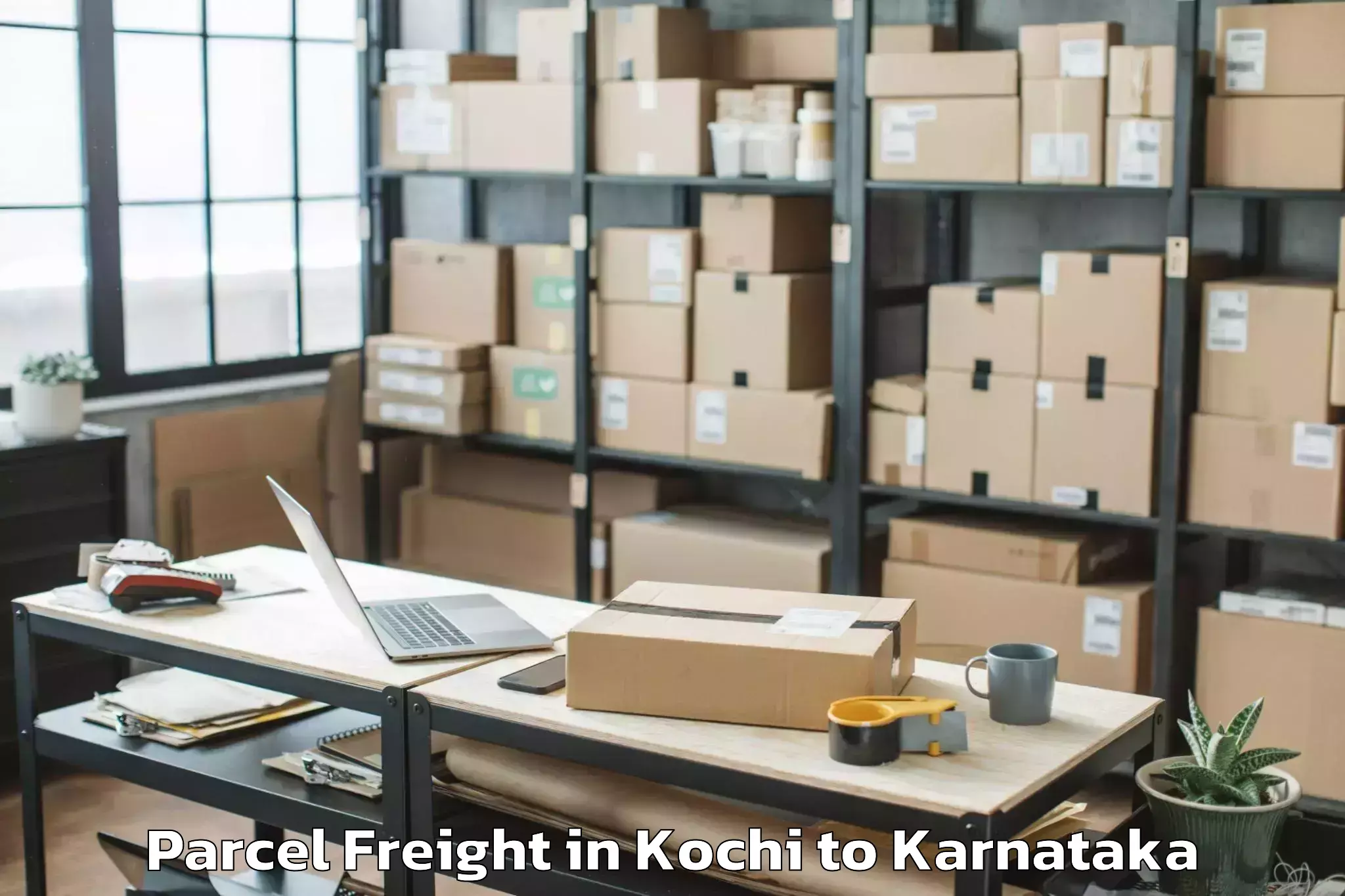 Book Kochi to Honnali Parcel Freight Online